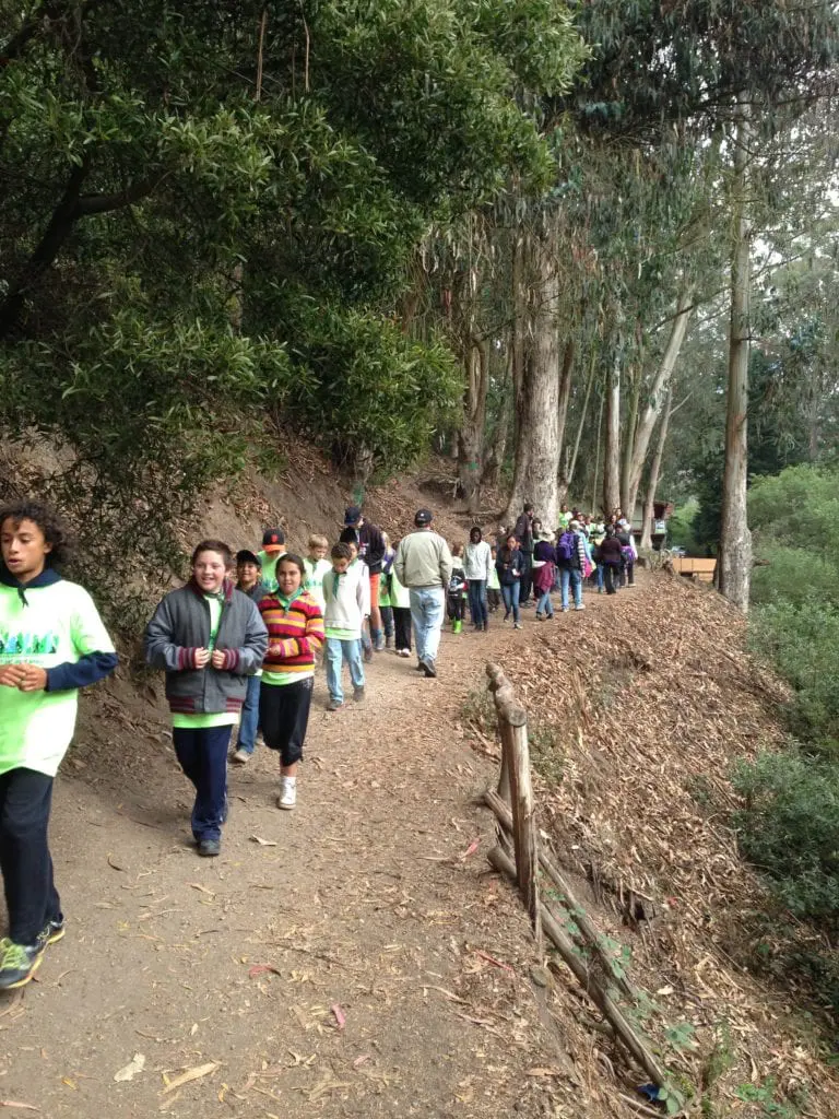 Silver Tree campers walking along Banana Slug Way on August 12. This rutted path will be improved during the 15 month Glen Canyon Trail Restoration Project by construction of retaining walls on both side of the narrow trail.