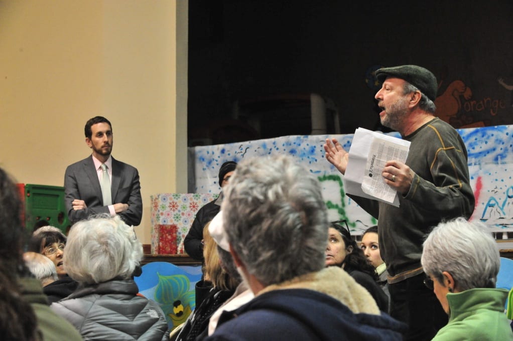 A neighbor speaks out against the need to cut trees to accomplish the renovation. District 8 representative Scott Wiener, left, listens. 