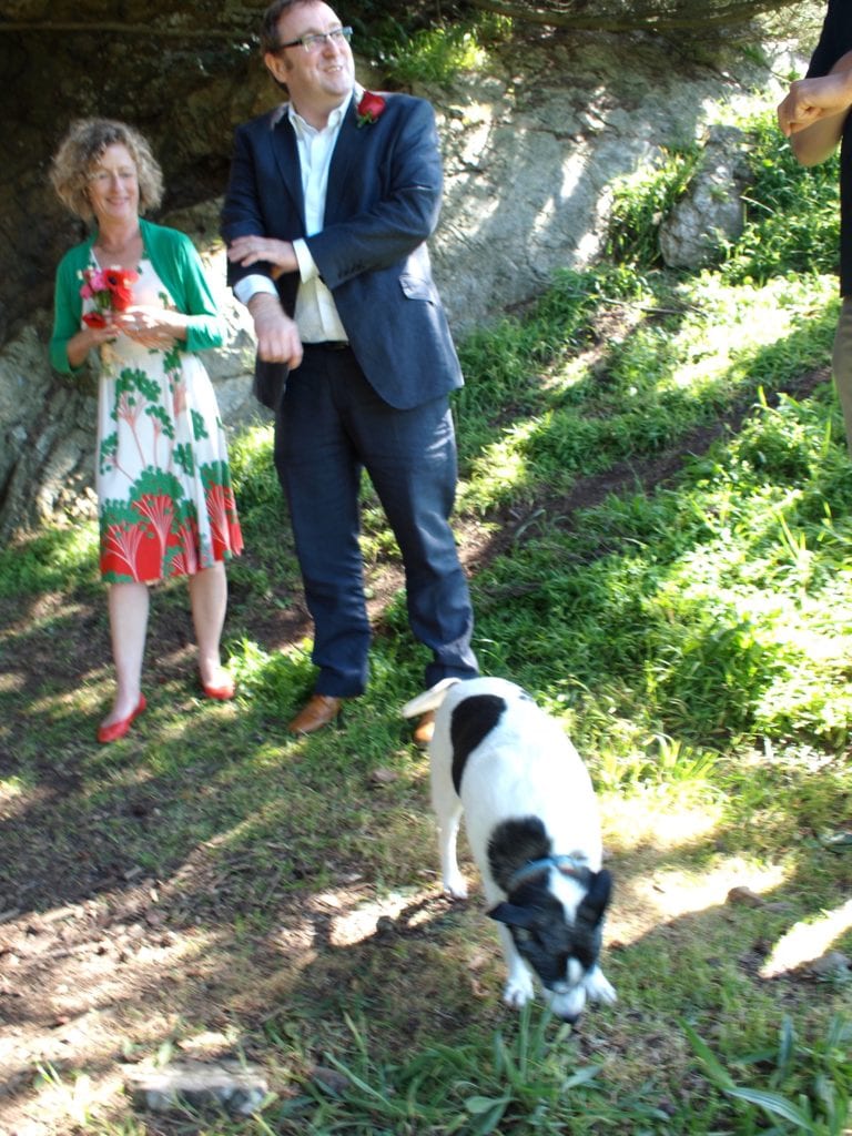 The wedding couple being attended by Jadey, family canine.