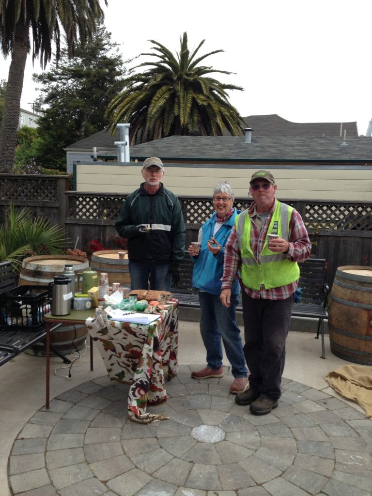 Taking a break from their weeding labors, Robert and Keren Abra, who live on Judson Ave and Rec and Park's Dave Crossman enjoy refreshments baked by Sally Ross. 