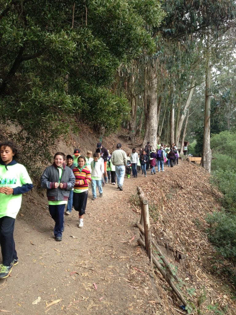 Silver Tree campers walking along Banana Slug Way on August 12. This rutted path will be improved during the 15 month Glen Canyon Trail Restoration Project by construction of retaining walls on both side of the narrow trail. 