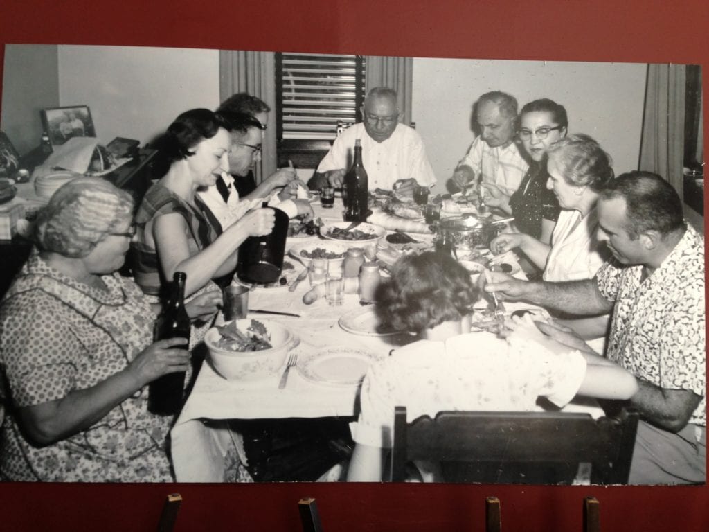 Ardiana family dinner. Gialina sits next to her daughter Rose Marie. Grandfather William sits at the head of the table and Pat, Sharon Ardiana older sister, Pat, sits at the foot of the table. Raymond Ardiana, Sharon's father, sits to Pat's right. Photo taken in 1956 in Pittsburgh.