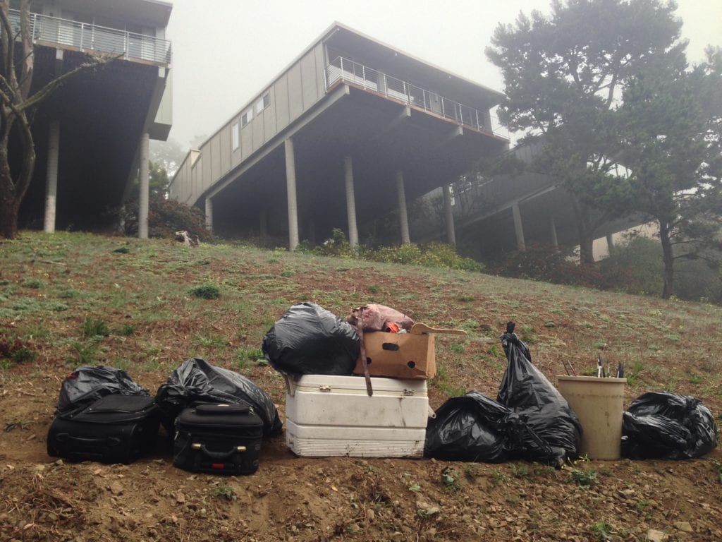 Belongings carried from Glen Canyon where a young homeless woman lived In December and January. The woman's camp was just below homes on Turquoise Drive.
