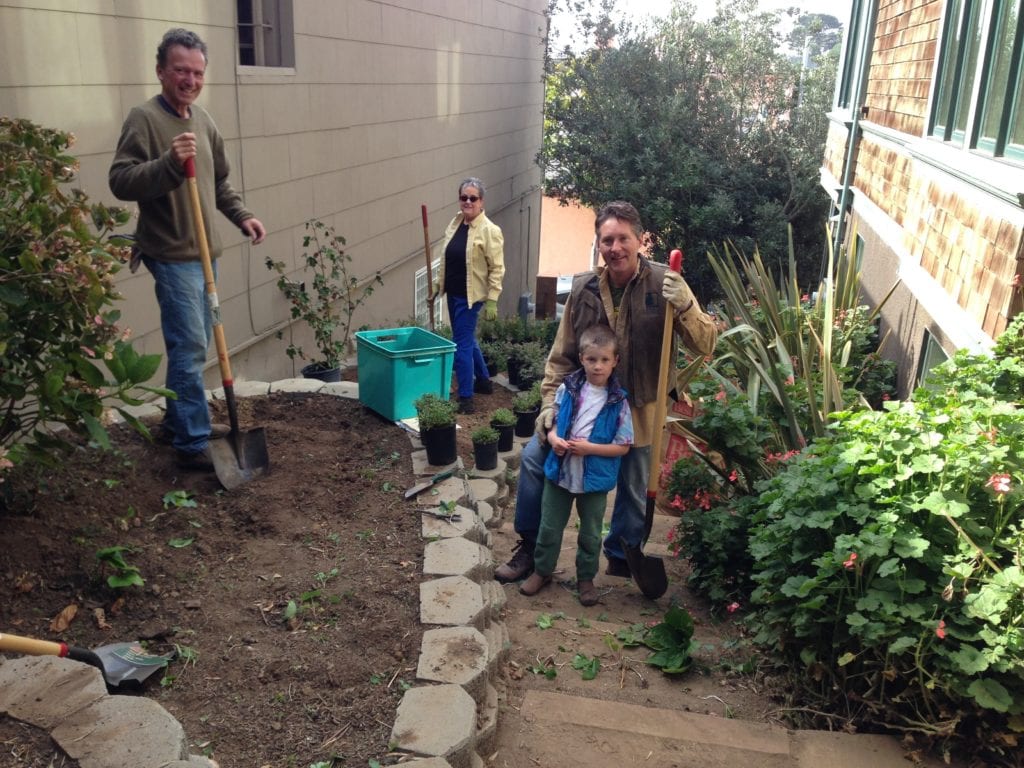   Adam King, Gregory Holmes and Billy Phoenix working on Surrey Street steps landscaping. 