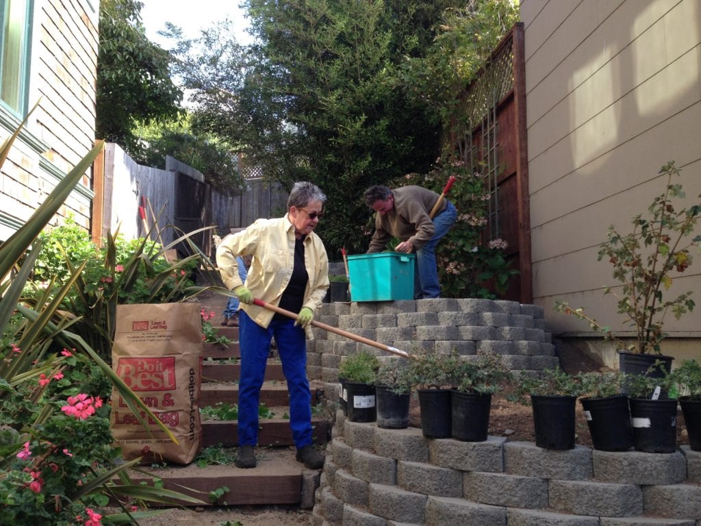 Kay Hamilton Estey and Adam KIng work, one of many Saturdays they volunteered to create the Surrey Street steps.