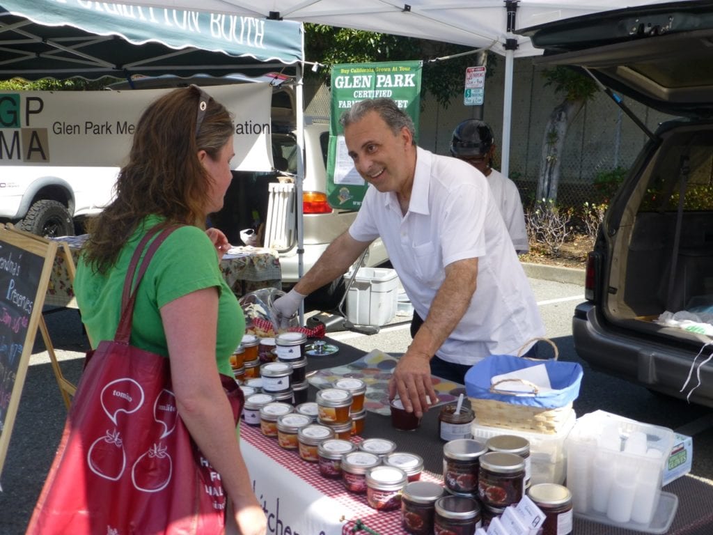 Fadi hand-selling his tasty preserves at the Glen Park Farmers Market. Photo by Stephen Labovsky