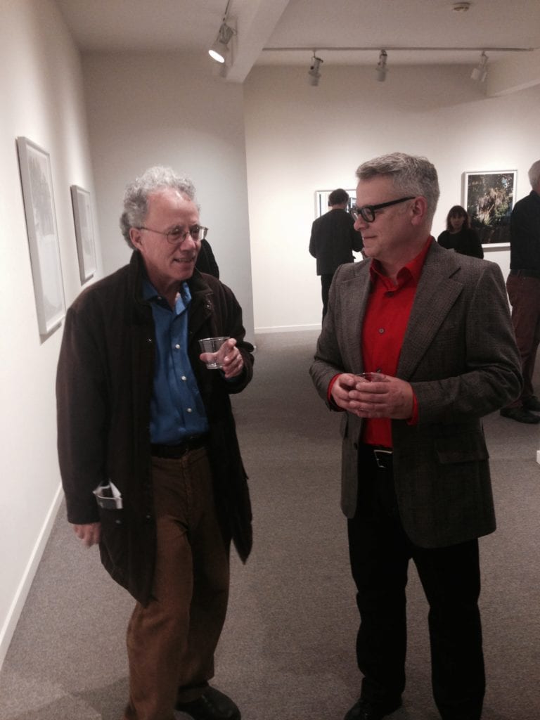 Glen Park Association president Michael Rice talking with John Priola
