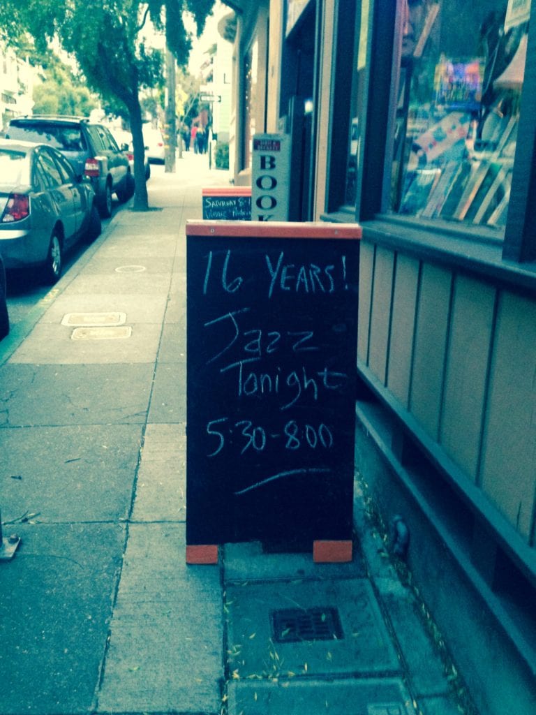 Street ad for May 22, 2015 Bird & Beckett Friday evening jazz, announcing sixteen years of playing music