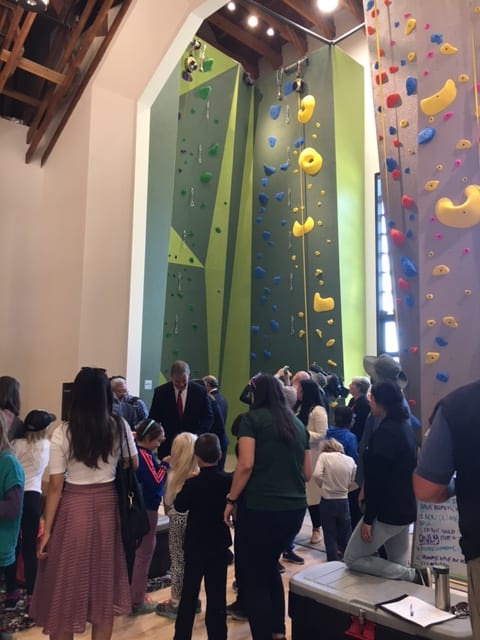 rock wall with guests